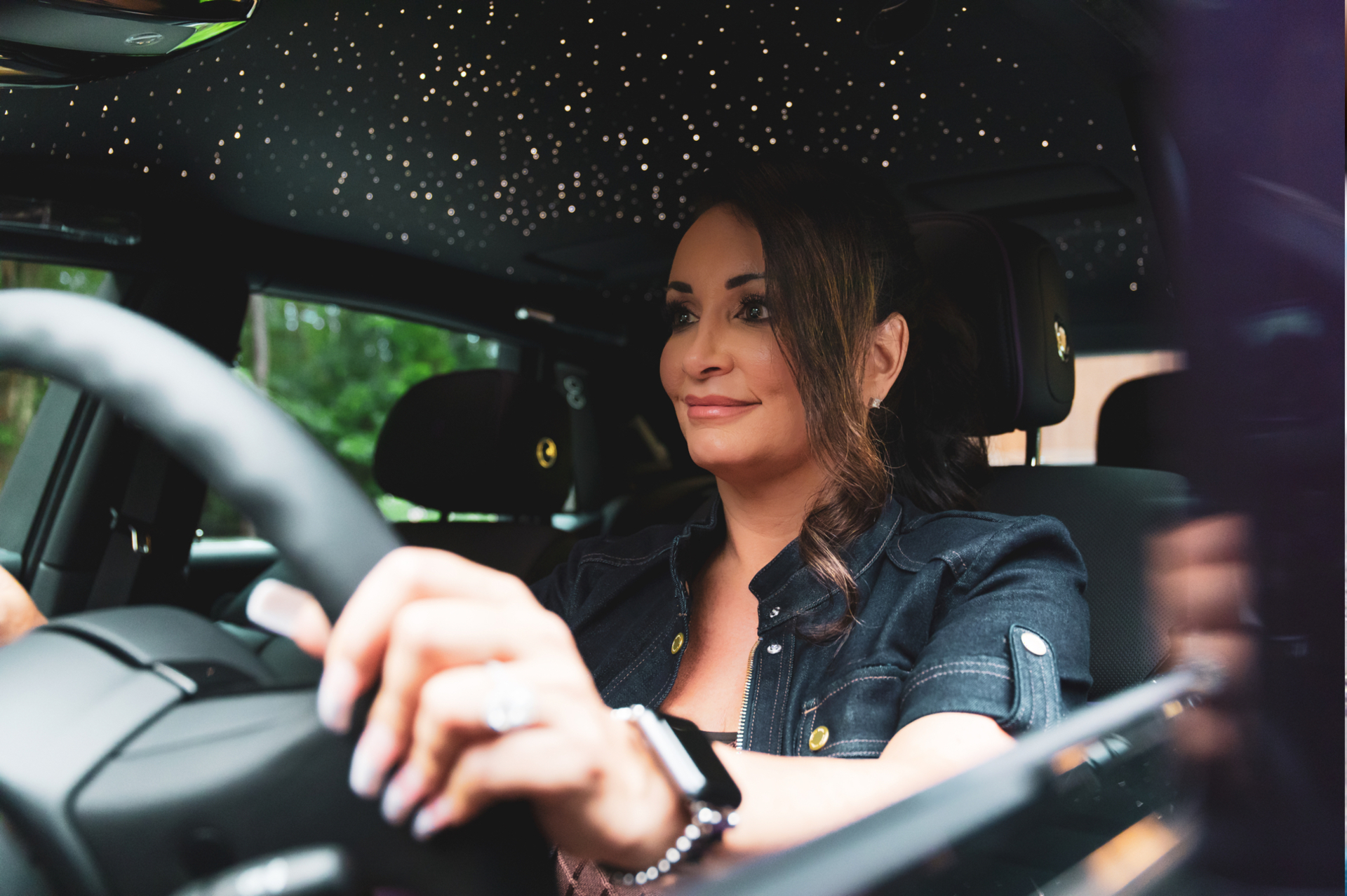 Colleen driving a Phantom
