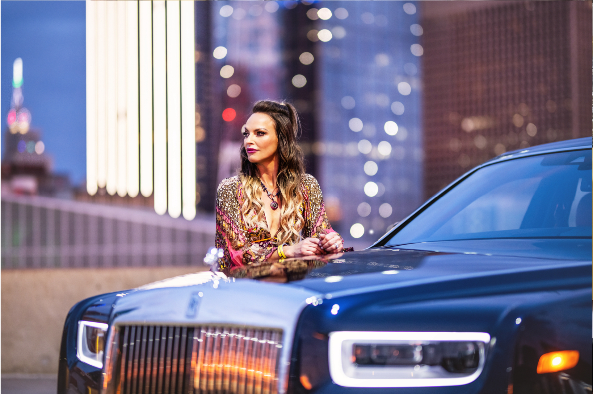 Melissa leaning on a Phantom