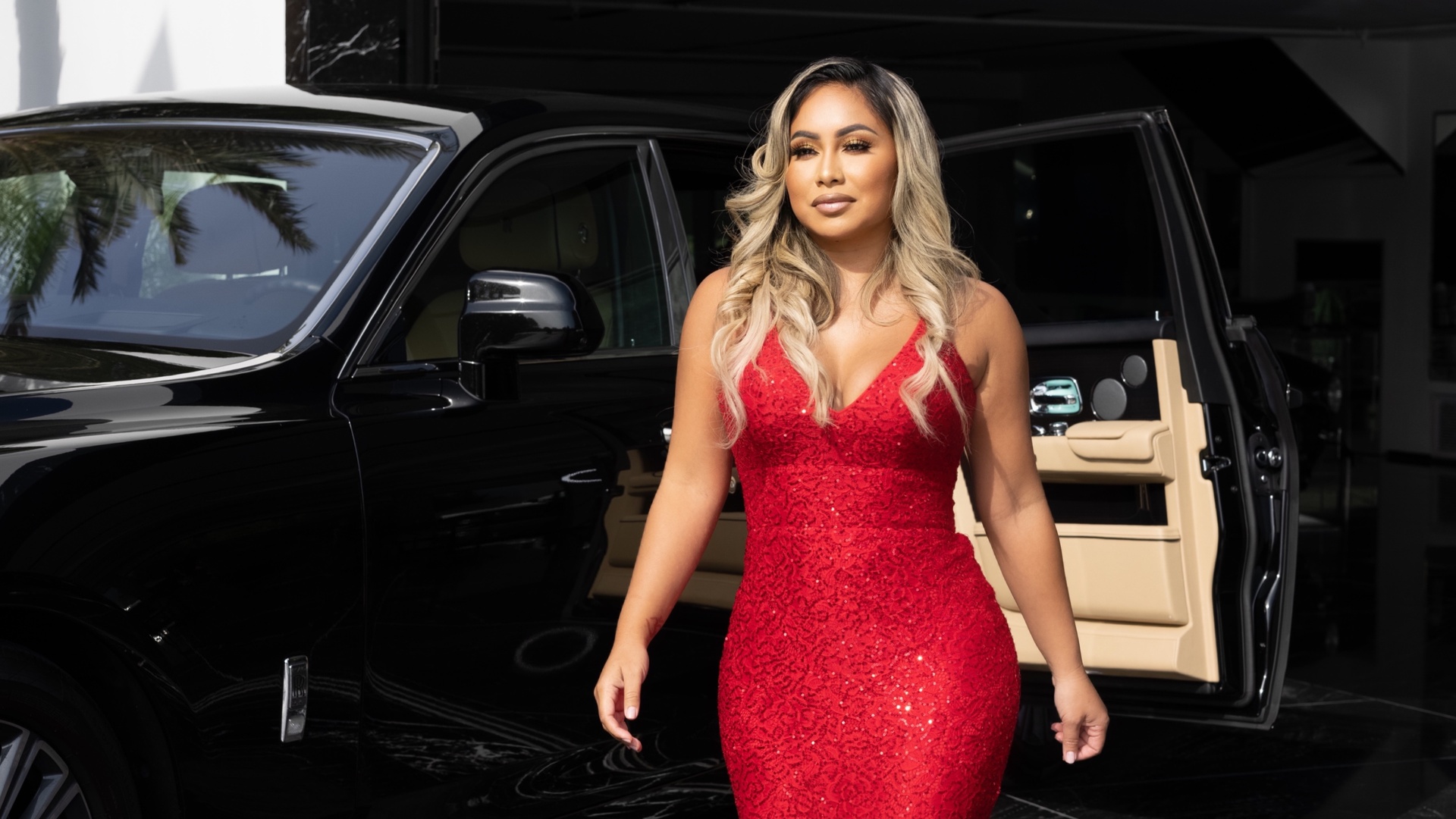 Shanti Hoffman next to her Rolls-Royce