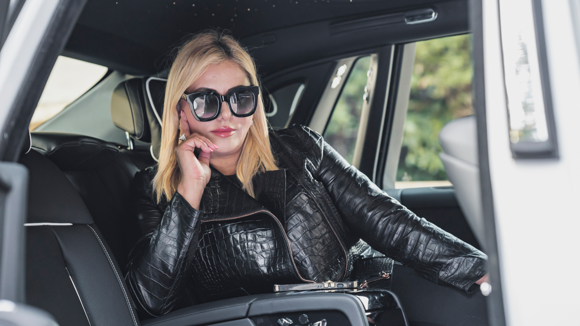 A photo of Susan Dahi inside her Rolls-Royce