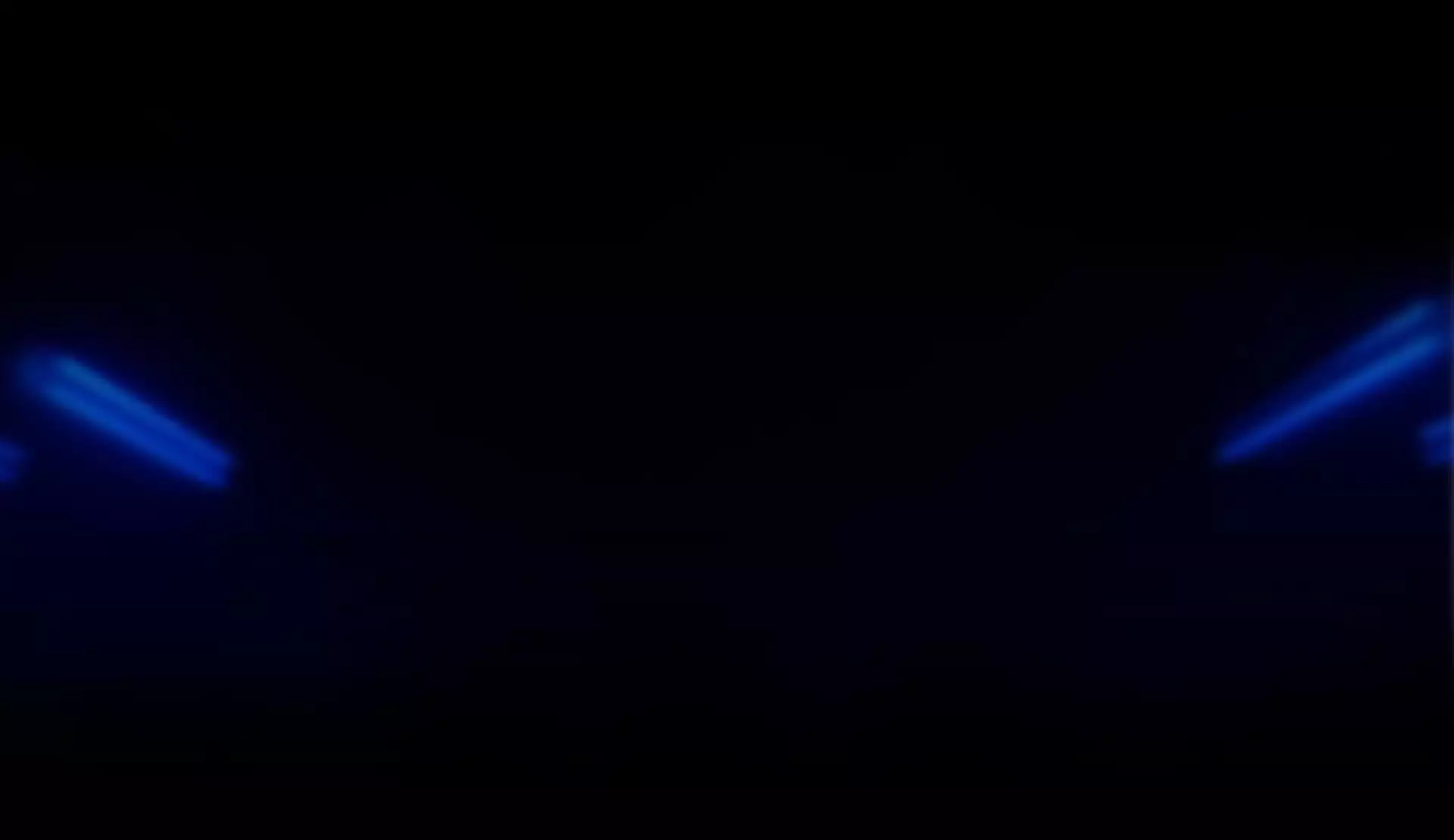 Blue strobe lights in a dark background