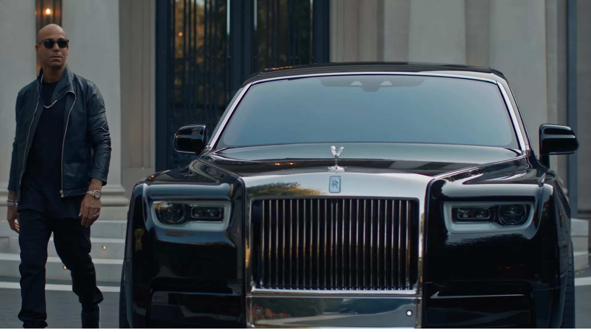 Ferris walking outside his Phantom