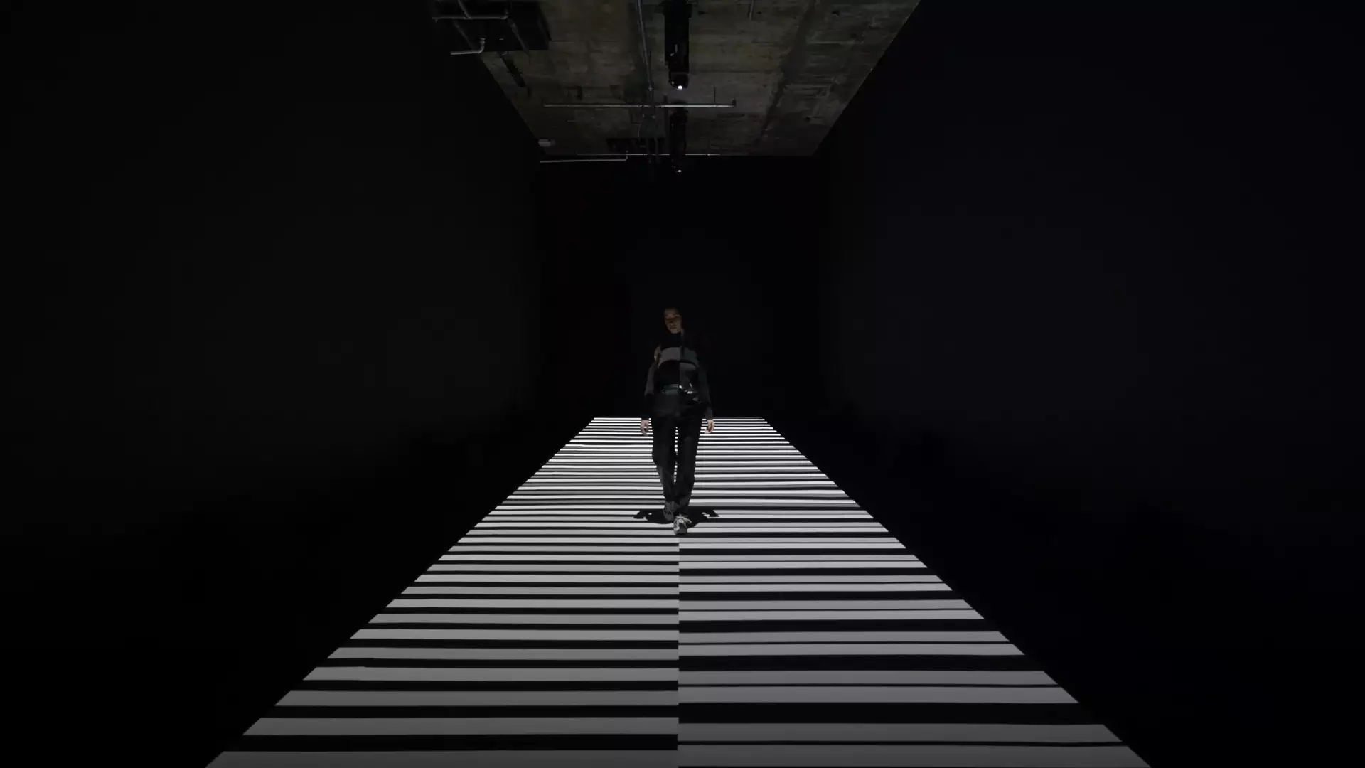Person stands within artwork by Japanese visual artist Ryoji Ikeda
