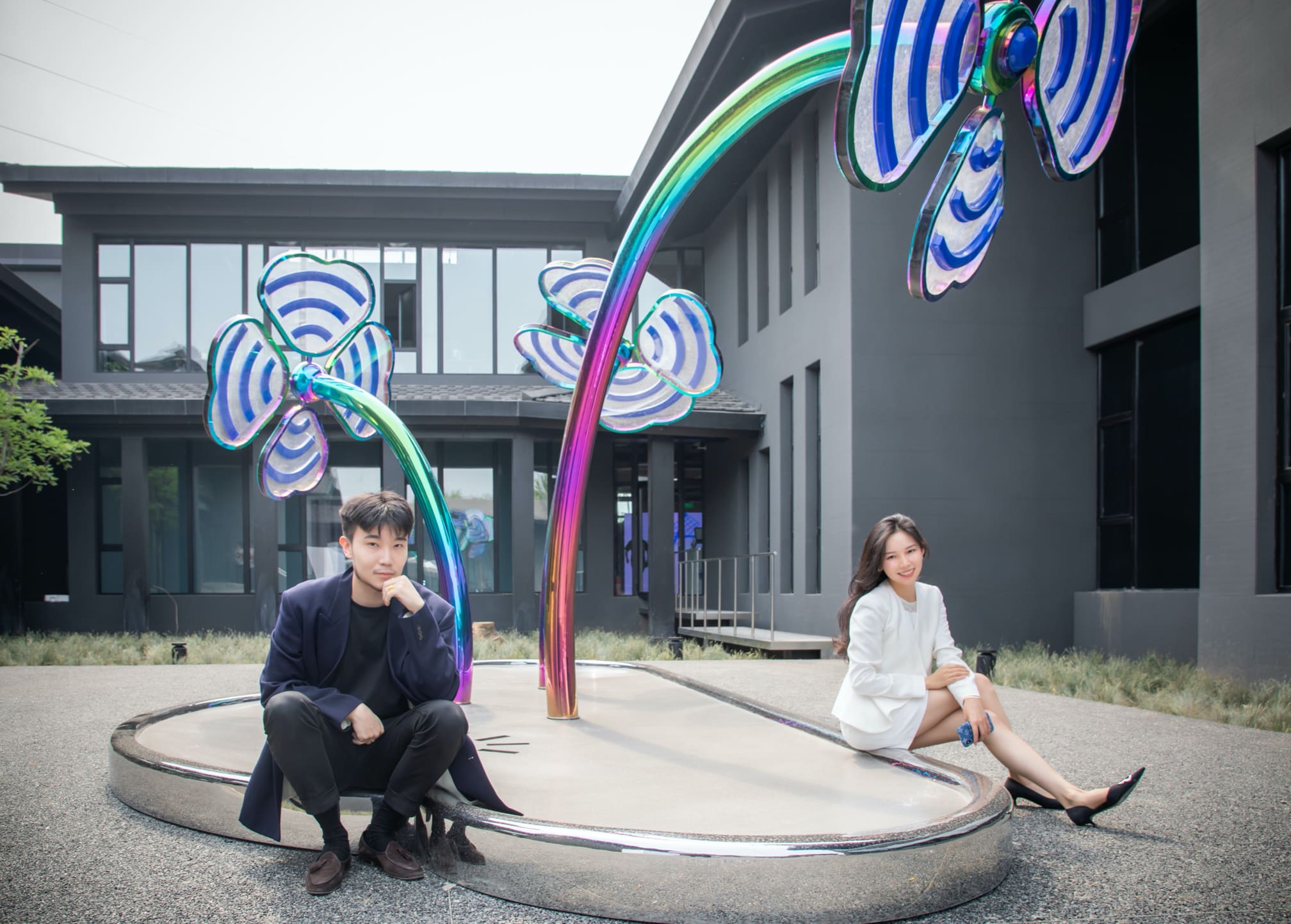 Michael Xufu with his business partner in the museum courtyard