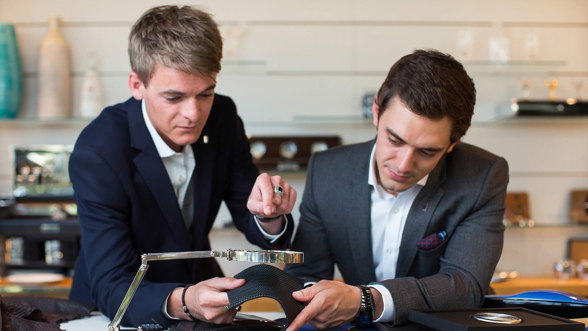 Two of Rolls-Royce's talented craftspeople sharing creative thoughts