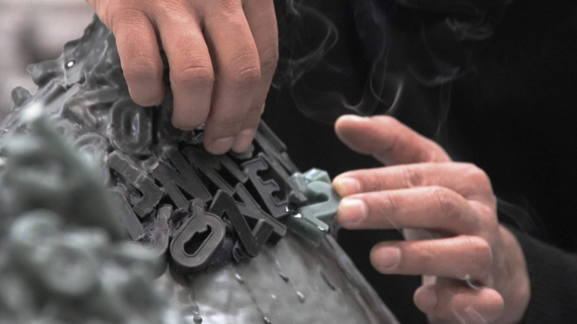 Mohammed Kazem working on one of his pieces using latitude and longitude co-ordinates.