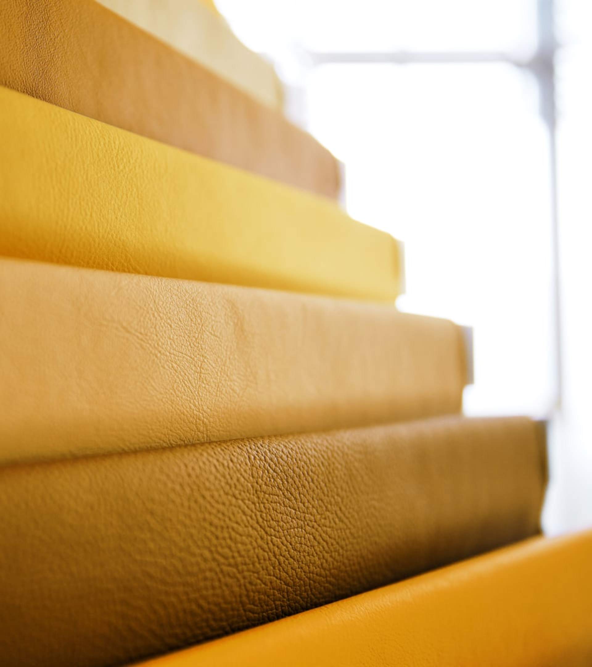 Acquiring and studying hundreds of leather samples to capture the essence of Forge Yellow