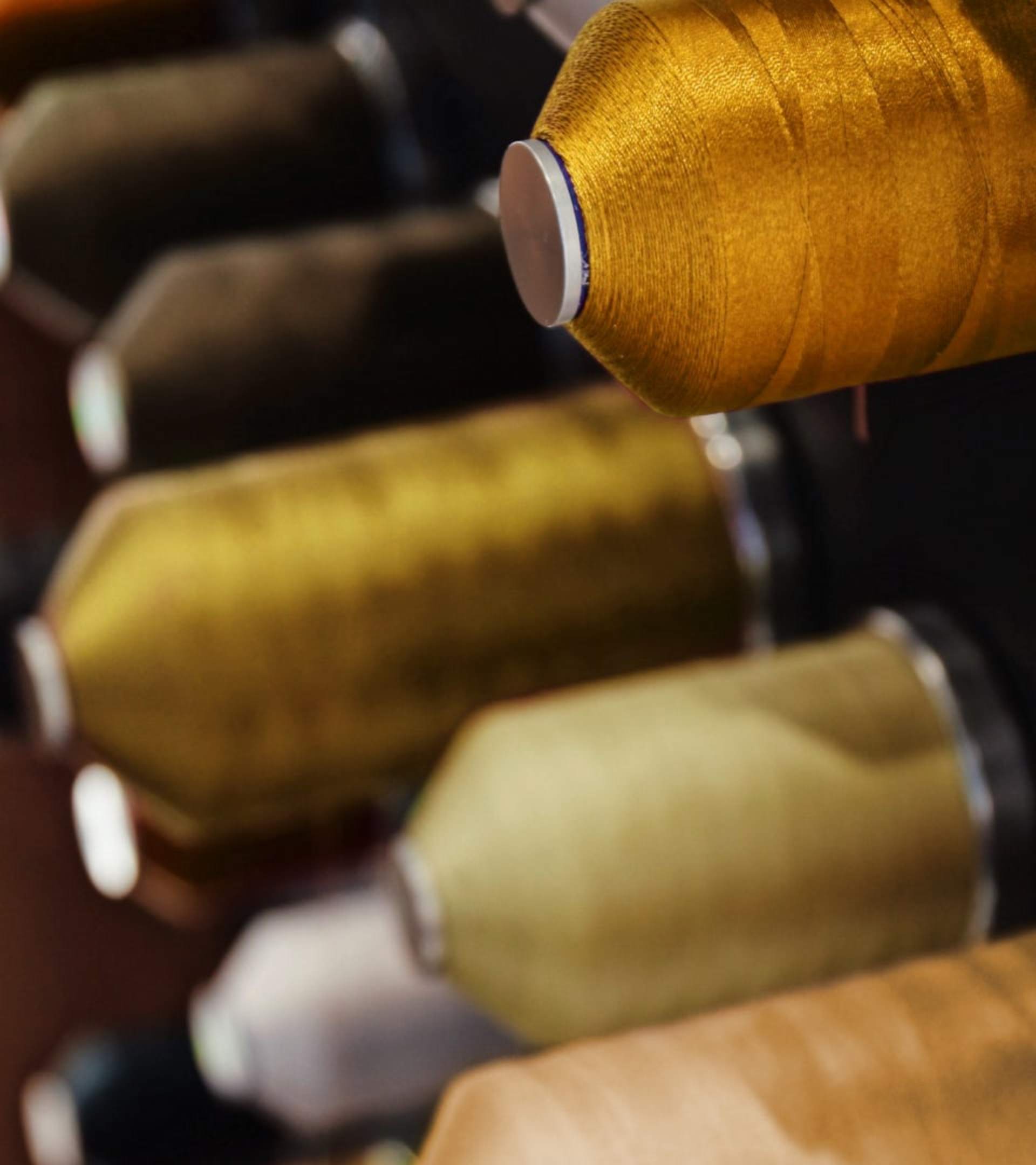 Meticulously colour-matching and testing the leather embroidery thread to capture the essence of Forge Yellow