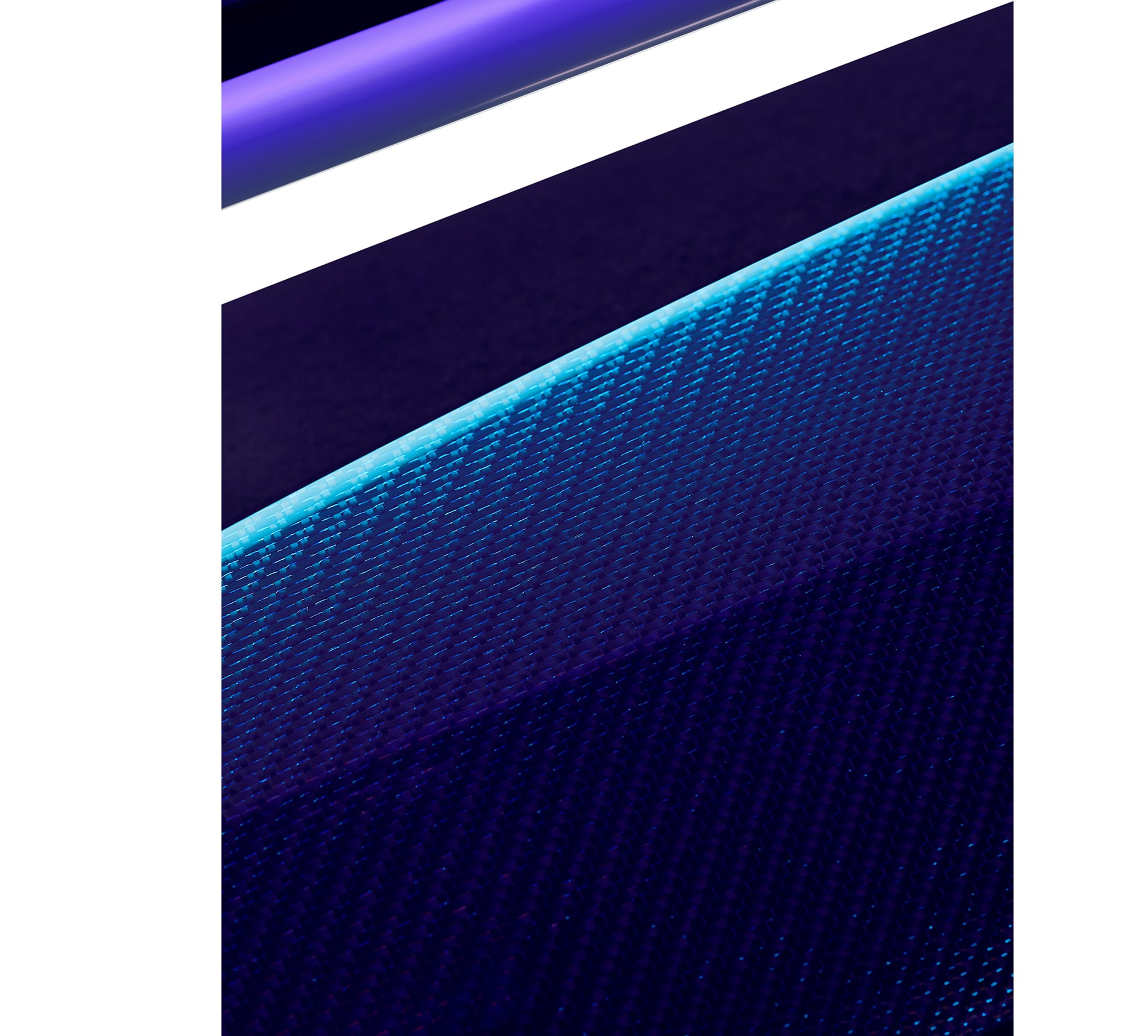 Close-up detail of Technical Weave, Rolls-Royce Bespoke's sparkling interpretation of carbon fibre, accented with tinted strands of aluminium thread