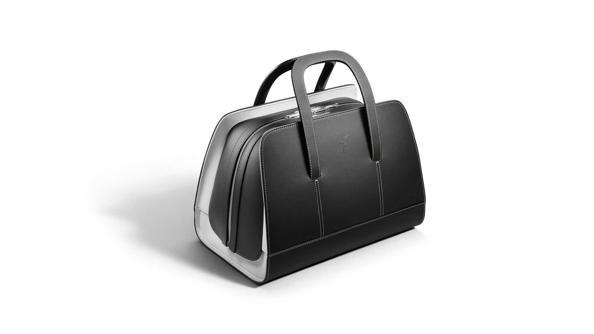 The Long Weekender in full, showing the luggage's exquisite craftsmanship and an elegant aesthetic