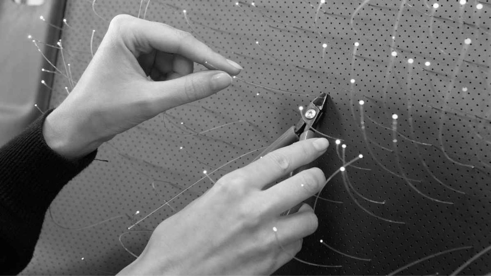 A Rolls-Royce craftspeople working on the Starlight Headliner