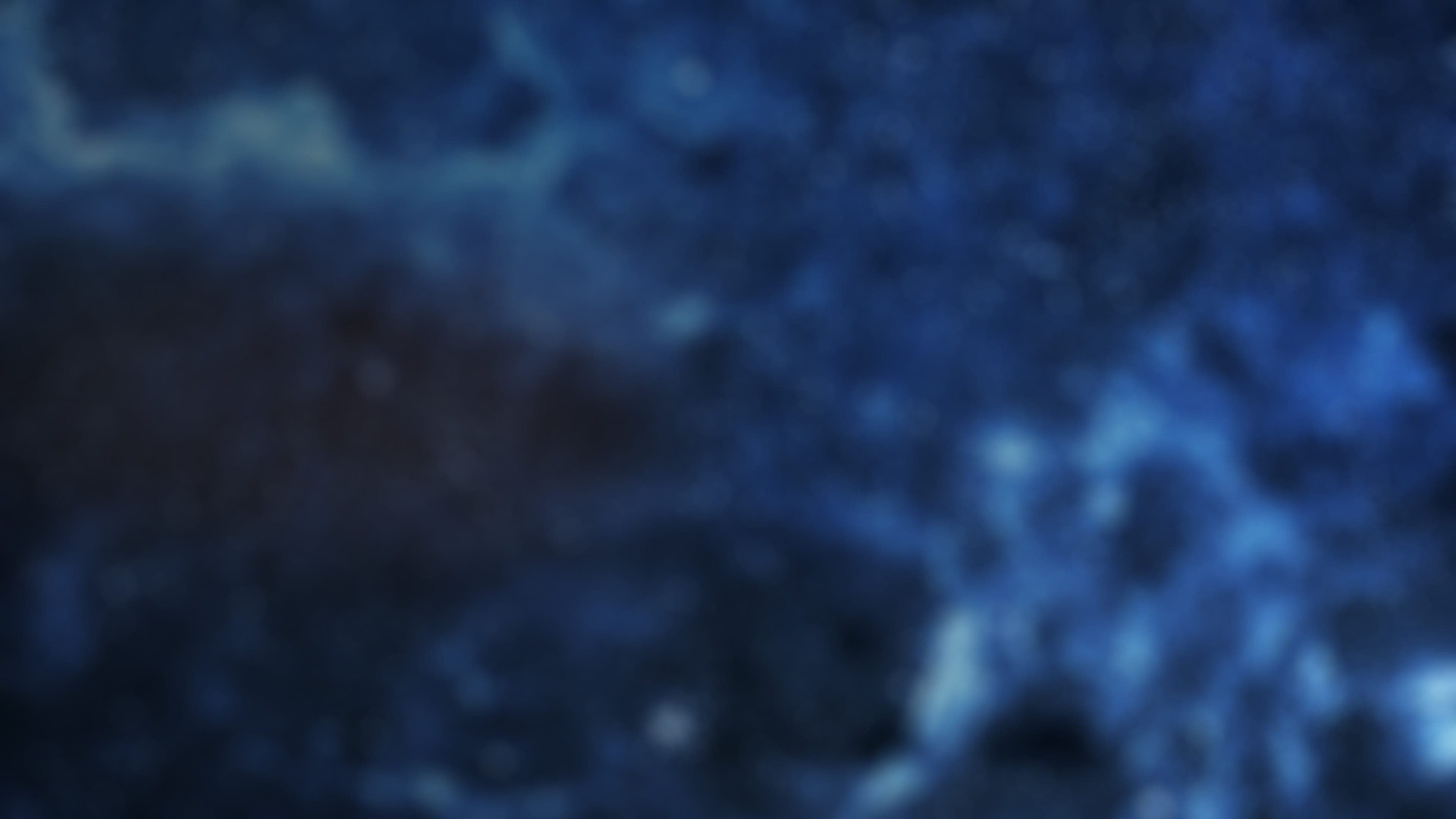 A starry night with a blue hue, resembling the Rolls-Royce Starlight Headliner