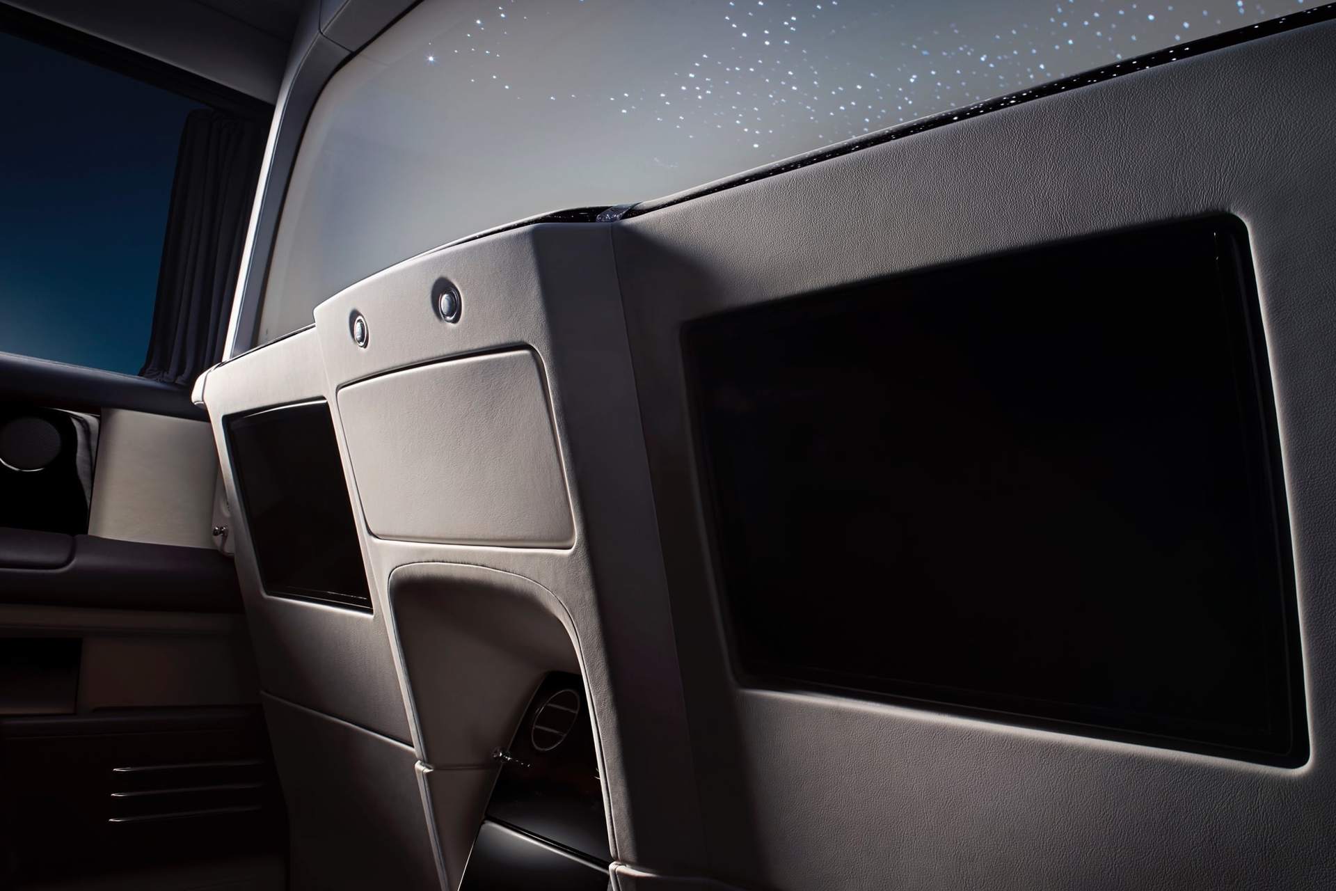 rolls royce phantom back side 2 tv's for the back seat passengers of the Phantom