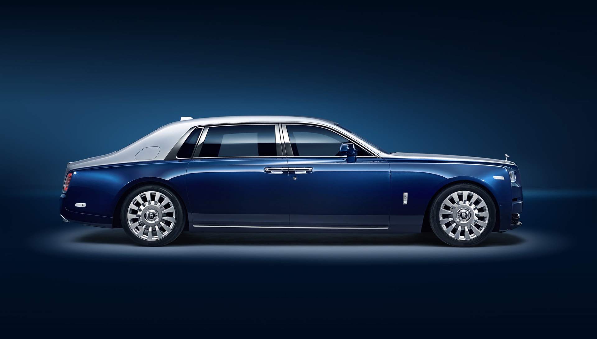 rolls royce phantom back side A portrait photograph of a Rolls-Royce phantom suite
