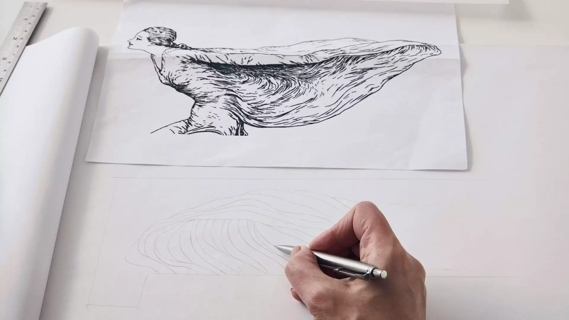 An image showing designer Helen Ann Murrey taking inspiration from an old illustration of the Spirit of Ecstasy to create a Phantom Gallery