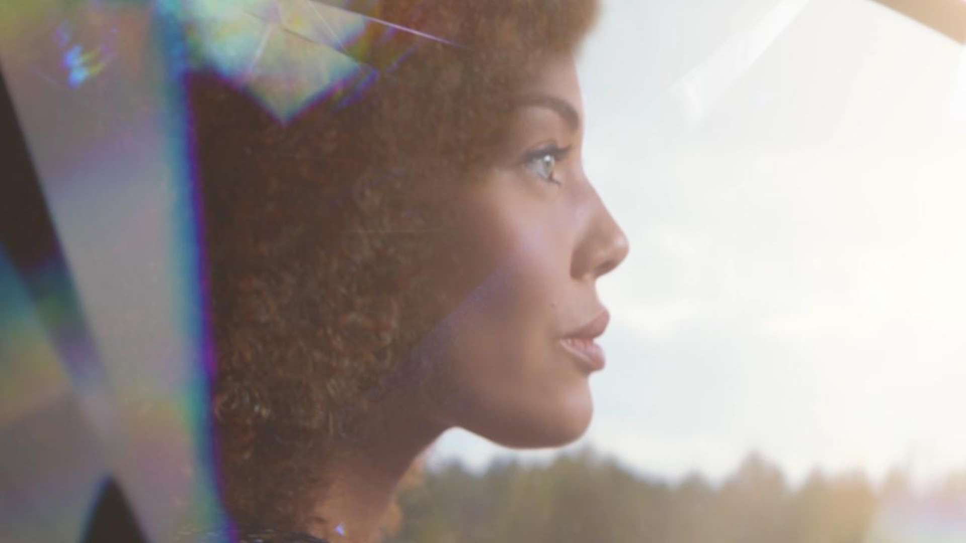 A woman sits in a Cullinan Rolls-Royce motor car