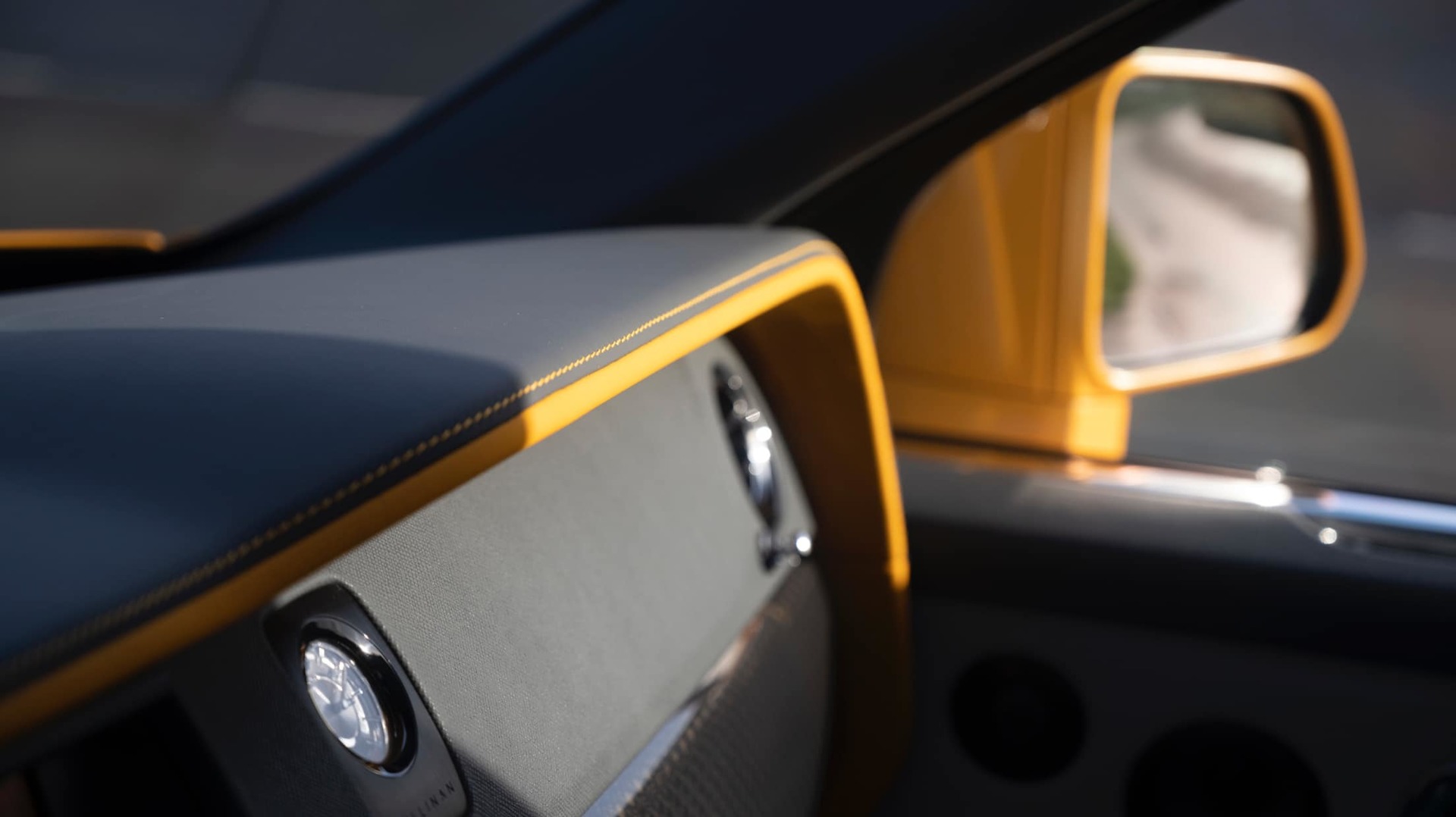 Interior clock and dashboard details in the bespoke Rolls-Royce Black Badge Cullinan Capella motor car