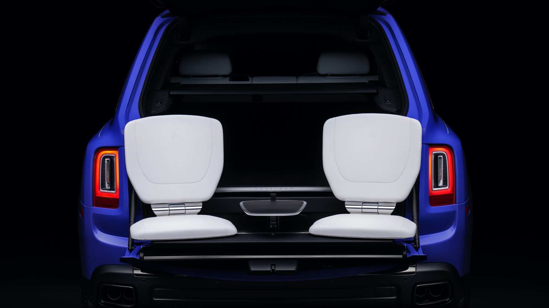 Black Badge Cullinan with rear door open and the bespoke Cullinan Viewing Suite set up.