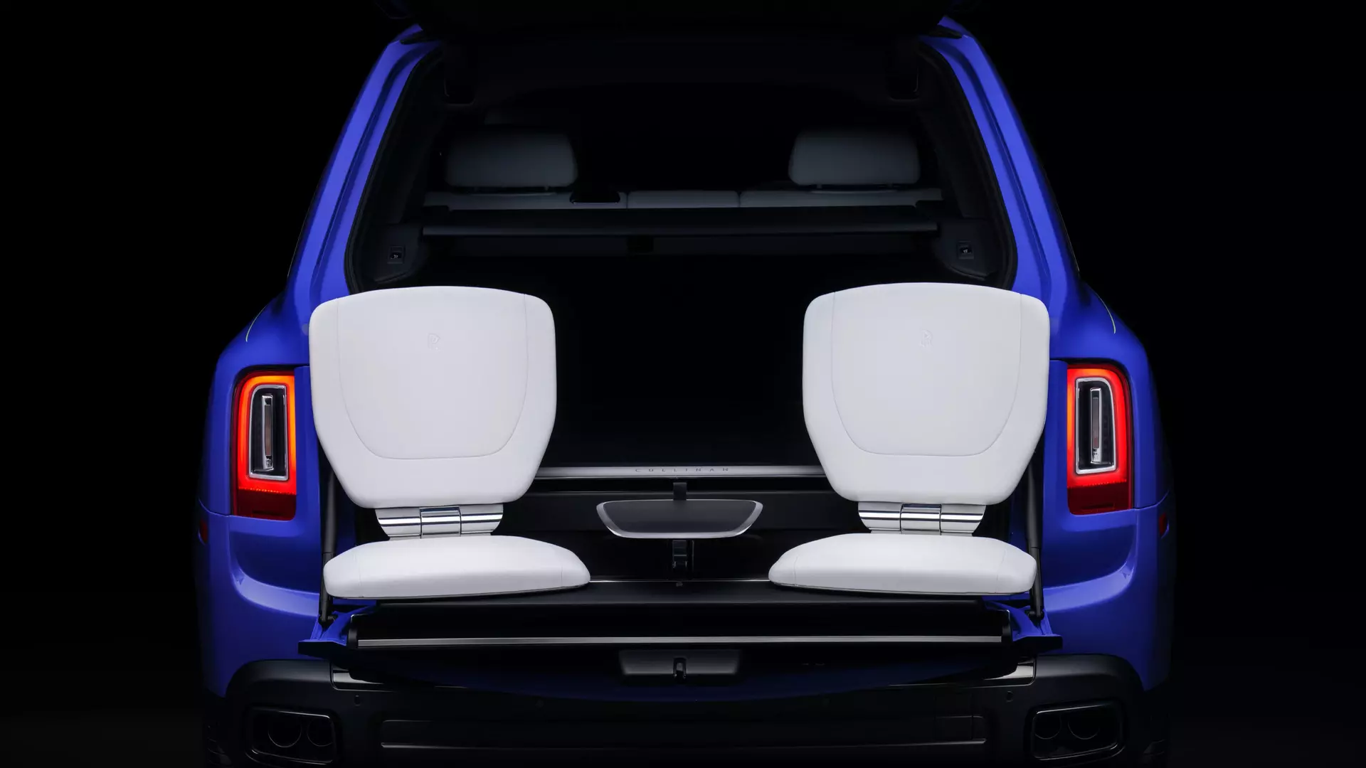 Black Badge Cullinan with rear door open and the bespoke Cullinan Viewing Suite set up.