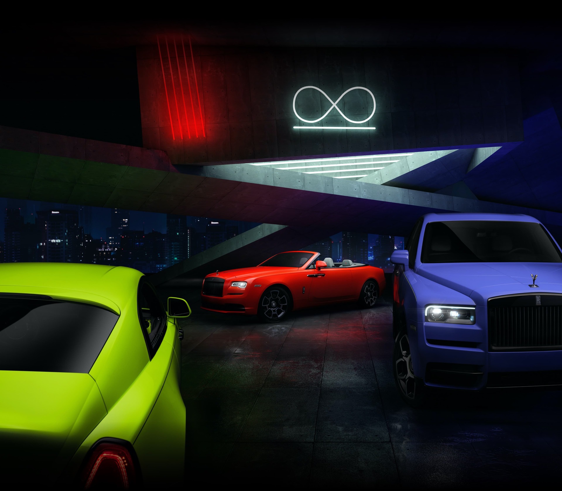 A shot of the Rolls-Royce Neon Nights bespoke collection showing a Cullinan, Wriath and Dawn Black Badge in  Mirabeau Blue, Lime Rock Green and Eagle Rock Red