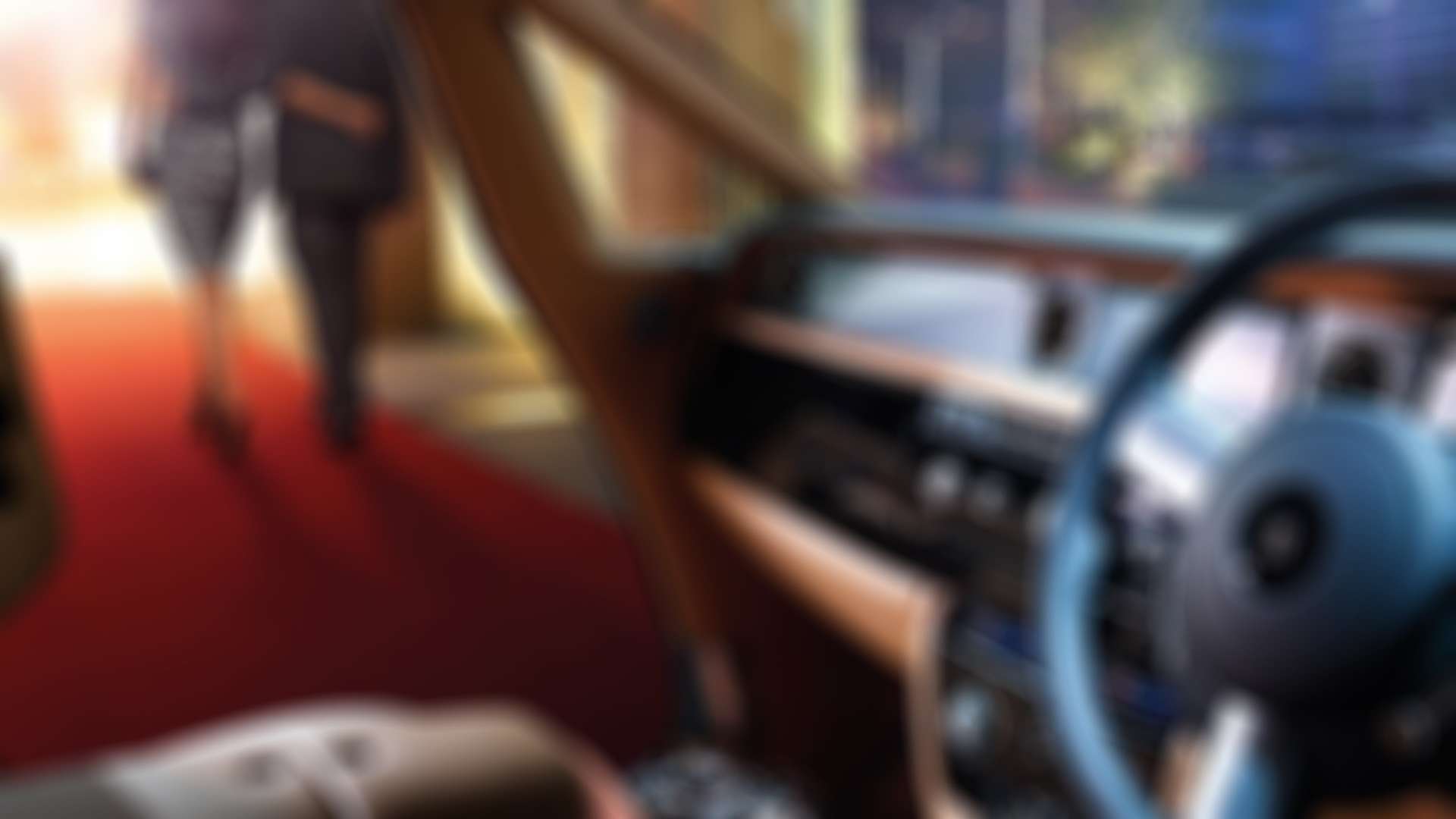 Interior dashboard of a Rolls-Royce Motor Car with the door open.