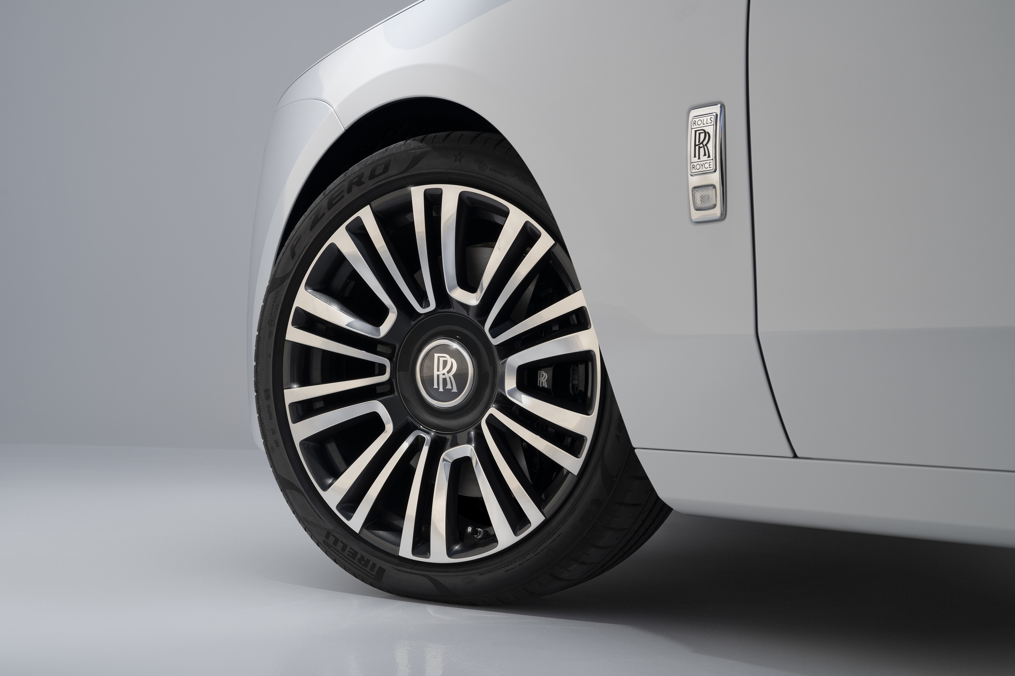 A close view of the front wheel of a Rolls-Royce Ghost 