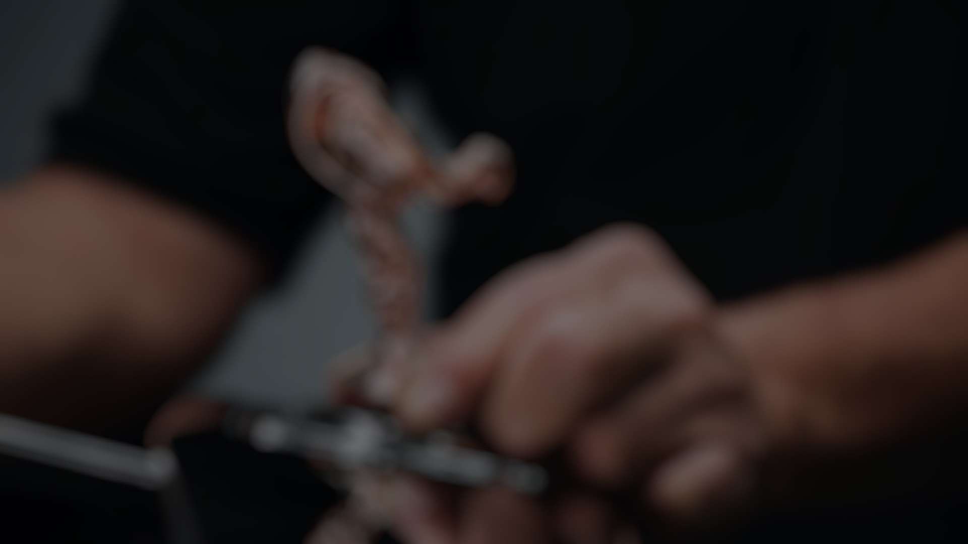 A technicial working on a Spirit of Ecstasy
