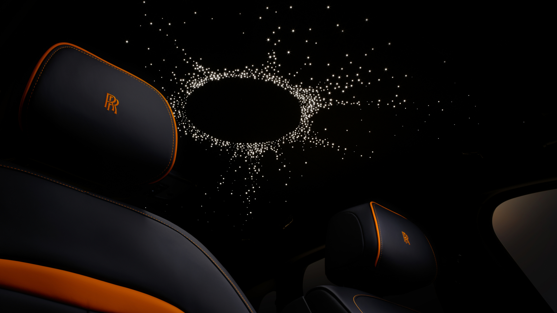 Close up of Black Badge Ghost Ekleipsis seat with Starlight Headliner lit up behind