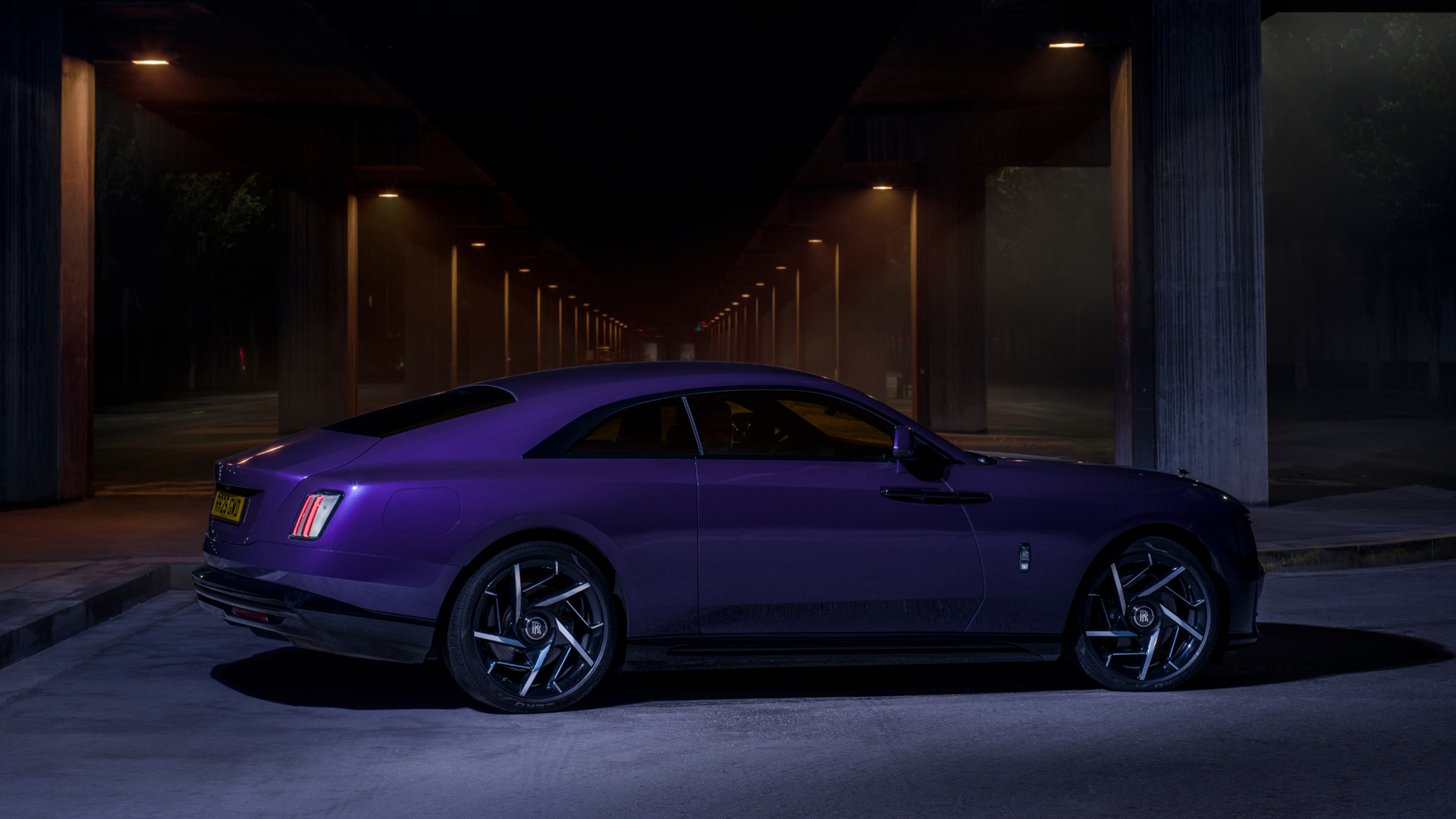 Side profile shot of the beautiful purple Black Badge Spectre.