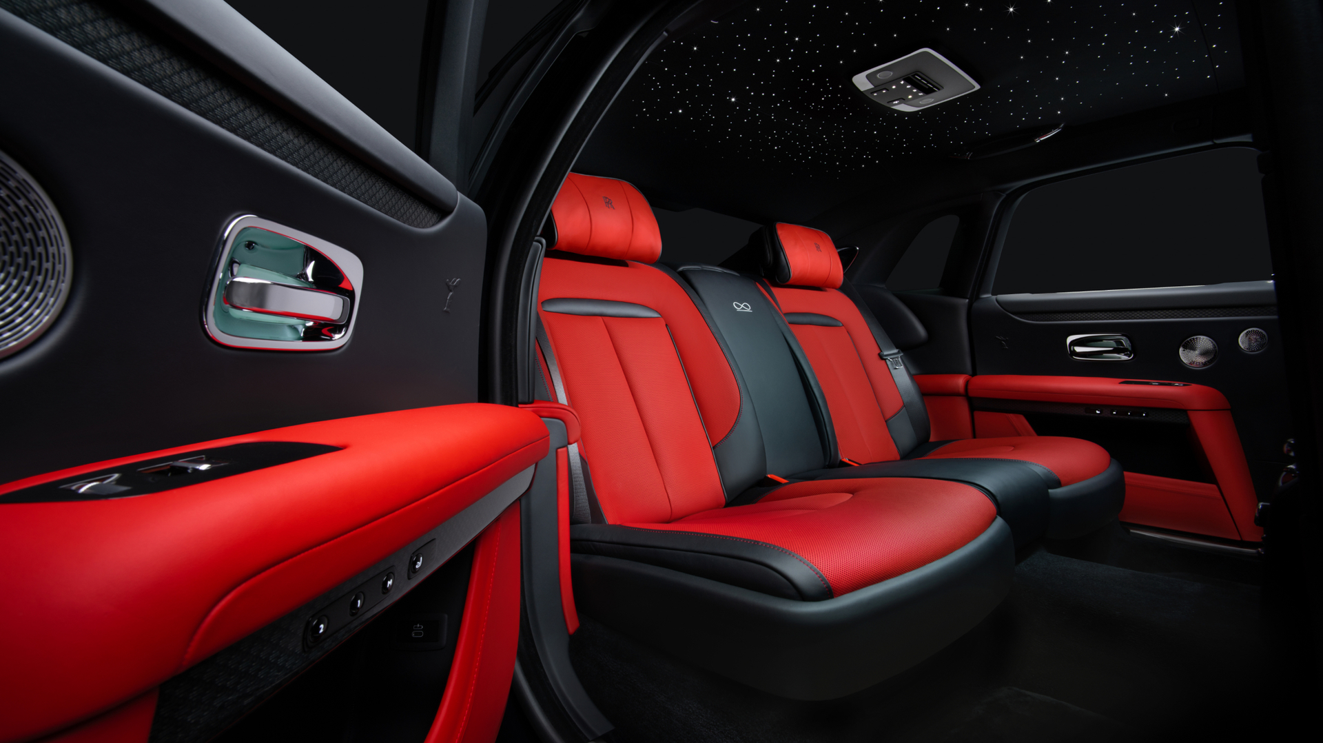 2023 rolls royce ghost images Red interior of black badge ghost displaying two passenger seats