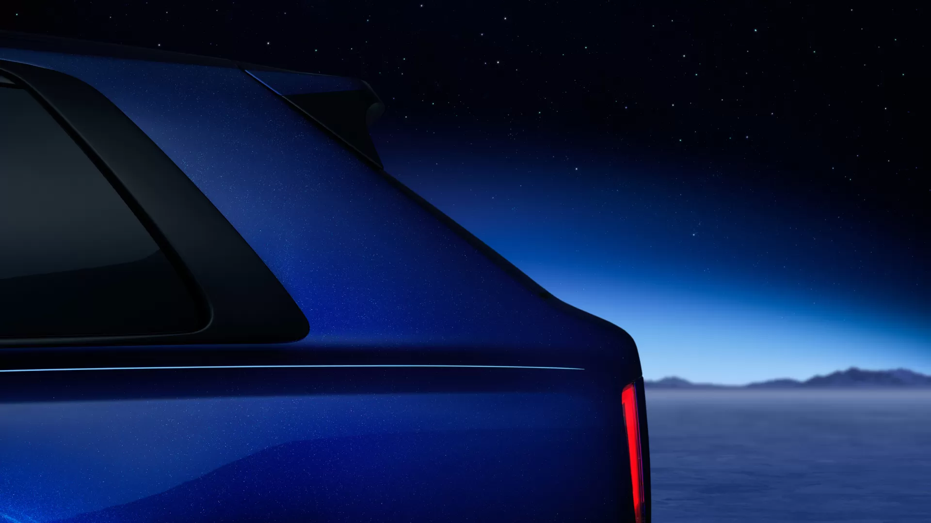 Side profile displaying back brake light of Blue Shadow Cullinan