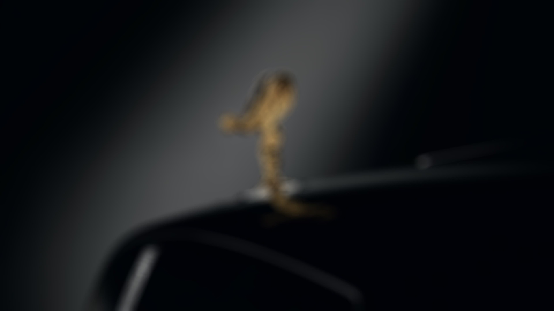 Gold Spirit of Ecstasy on Rolls-Royce motor car