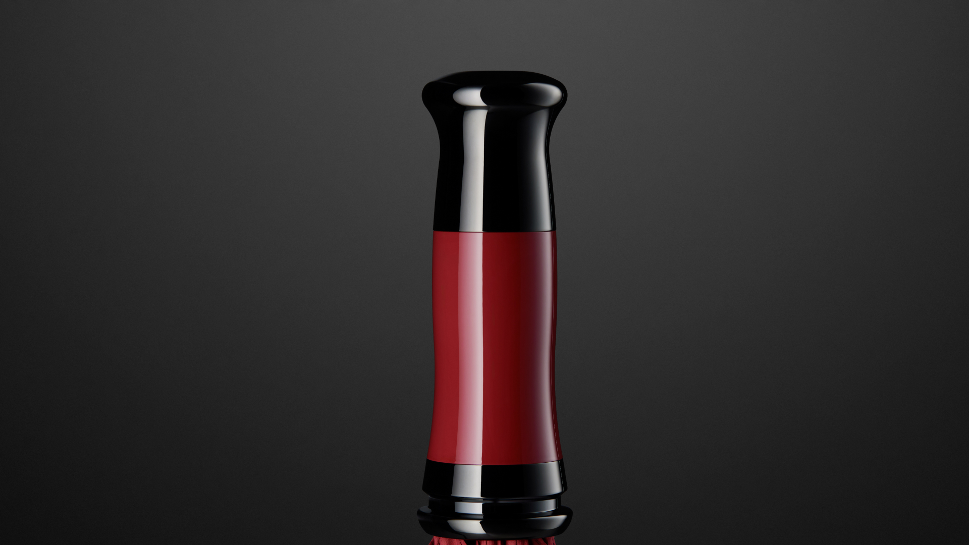 Rolls Royce Peony Pink umbrella with a stylish black chrome handle.