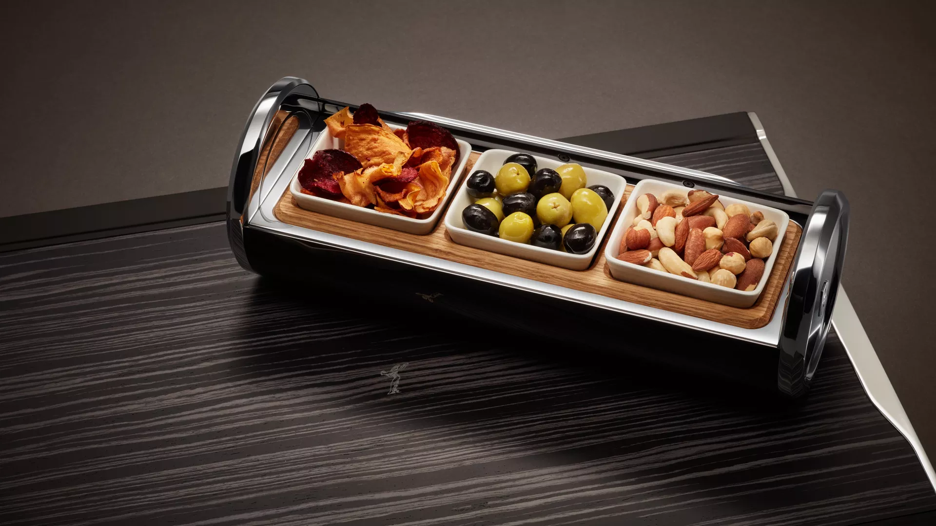 Rolls Royce custom snack box displaying olives and peanuts