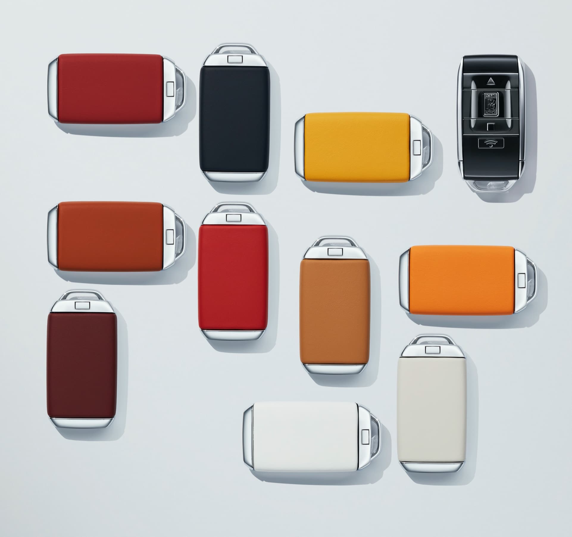 Stylish range of key backs in forge yellow, arctic white, seashell, tan, mandarin, mugello red, ardent red, hotspur red and armagnac.