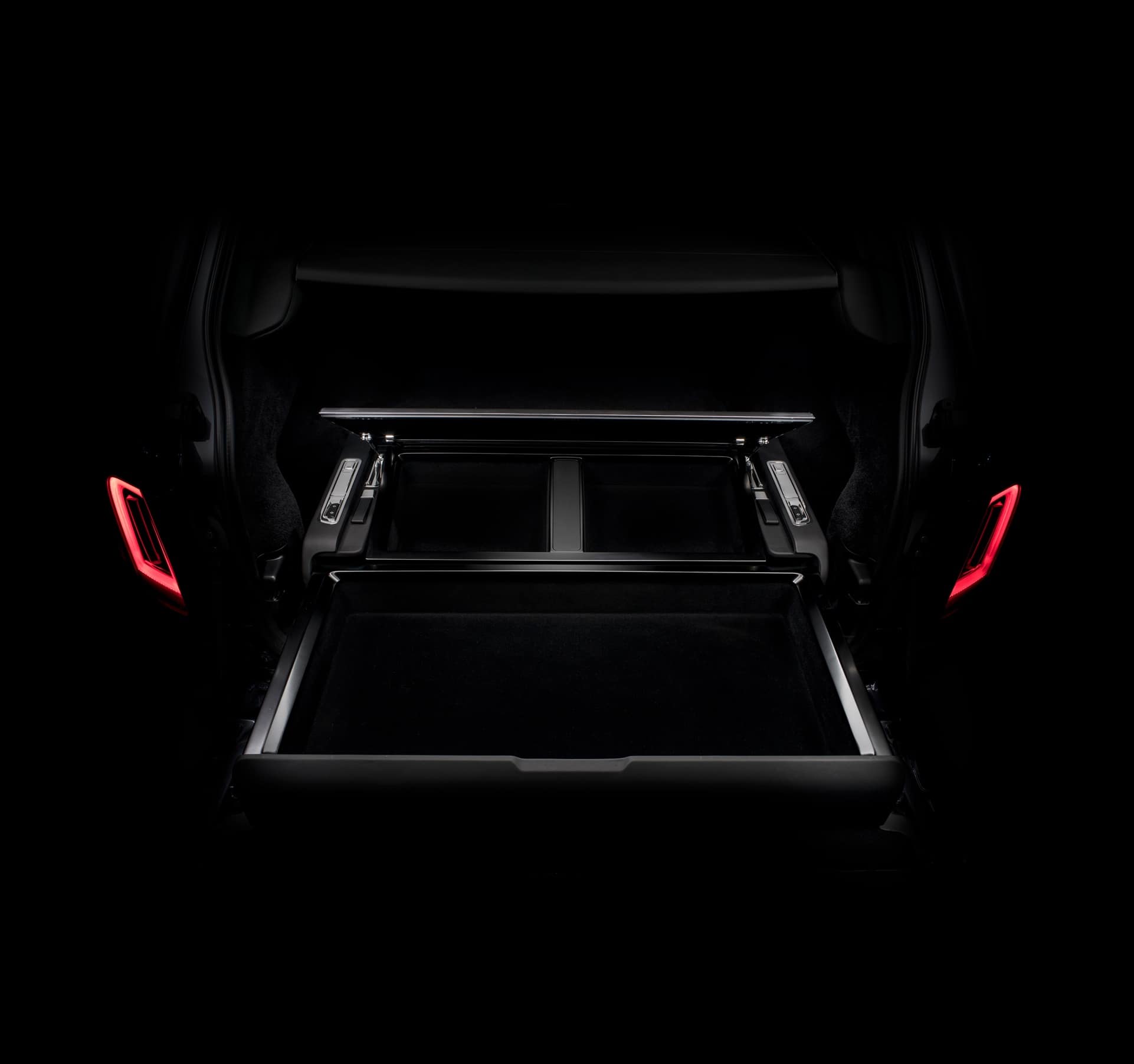 Rolls-Royce Cullinan motor car with rear door open to reveal Cullinan recreation module offering 48 litres of internal storage at the touch of a button