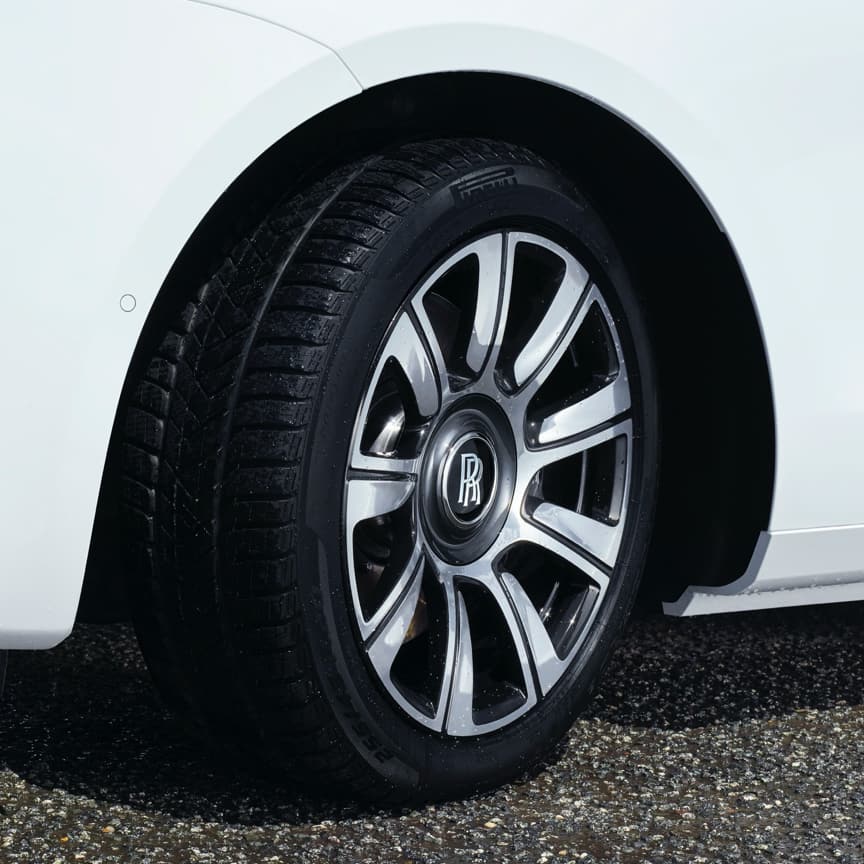 <p>Take on even the most challenging terrains, with 20-inch winter wheels and tyres, designed narrower, with a higher sidewall for optimum performance. They offer up to 20% better road grip in temperatures below 7°C / 44°F, greater traction on ice and snow, and reduce the risk of aquaplaning on wet roads. A striking 20” bi-colour black and polished metal wheel is available exclusively from launch of New Ghost. </p>