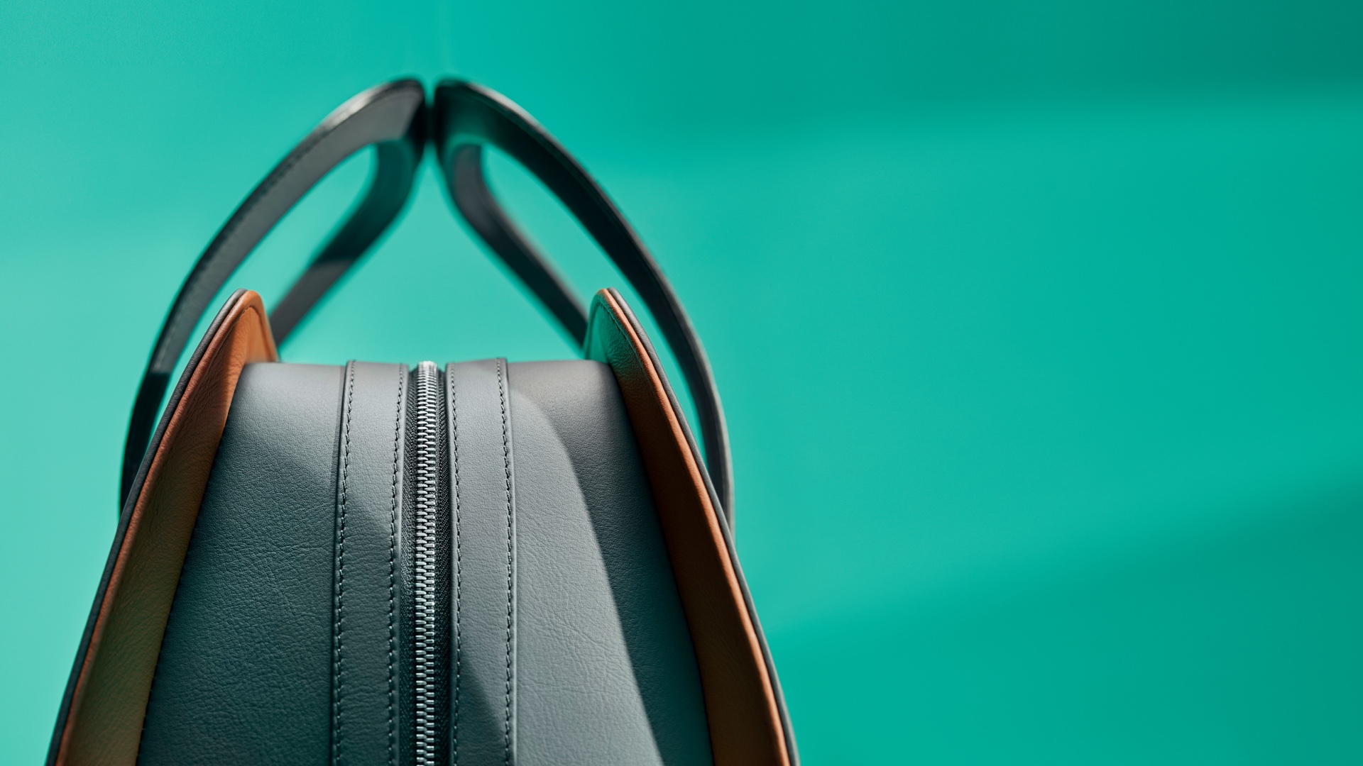Side view of the Weekender bag in black colour