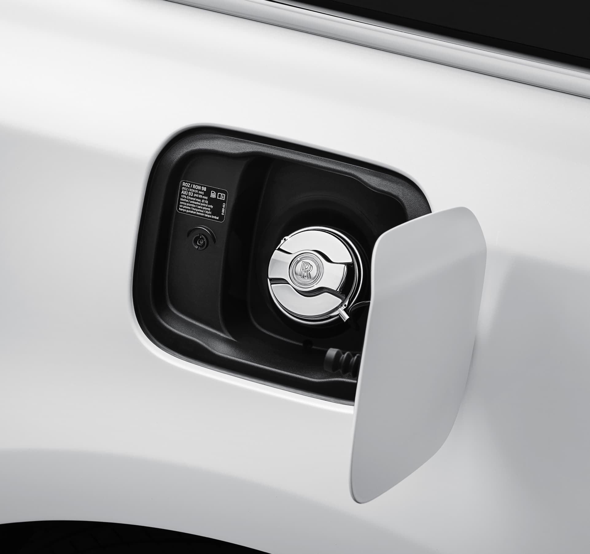 Rolls-Royce metal fuel filler cap with monogram, created from high-quality polished chrome plating with mirror finish