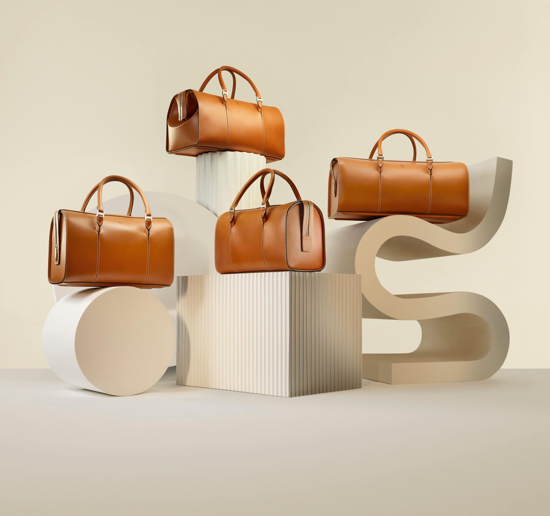 Rolls-Royce Phantom luggage collection arranged on abstract, geometric plinths