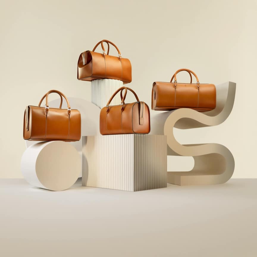 Rolls-Royce Phantom luggage collection arranged on abstract, geometric plinths