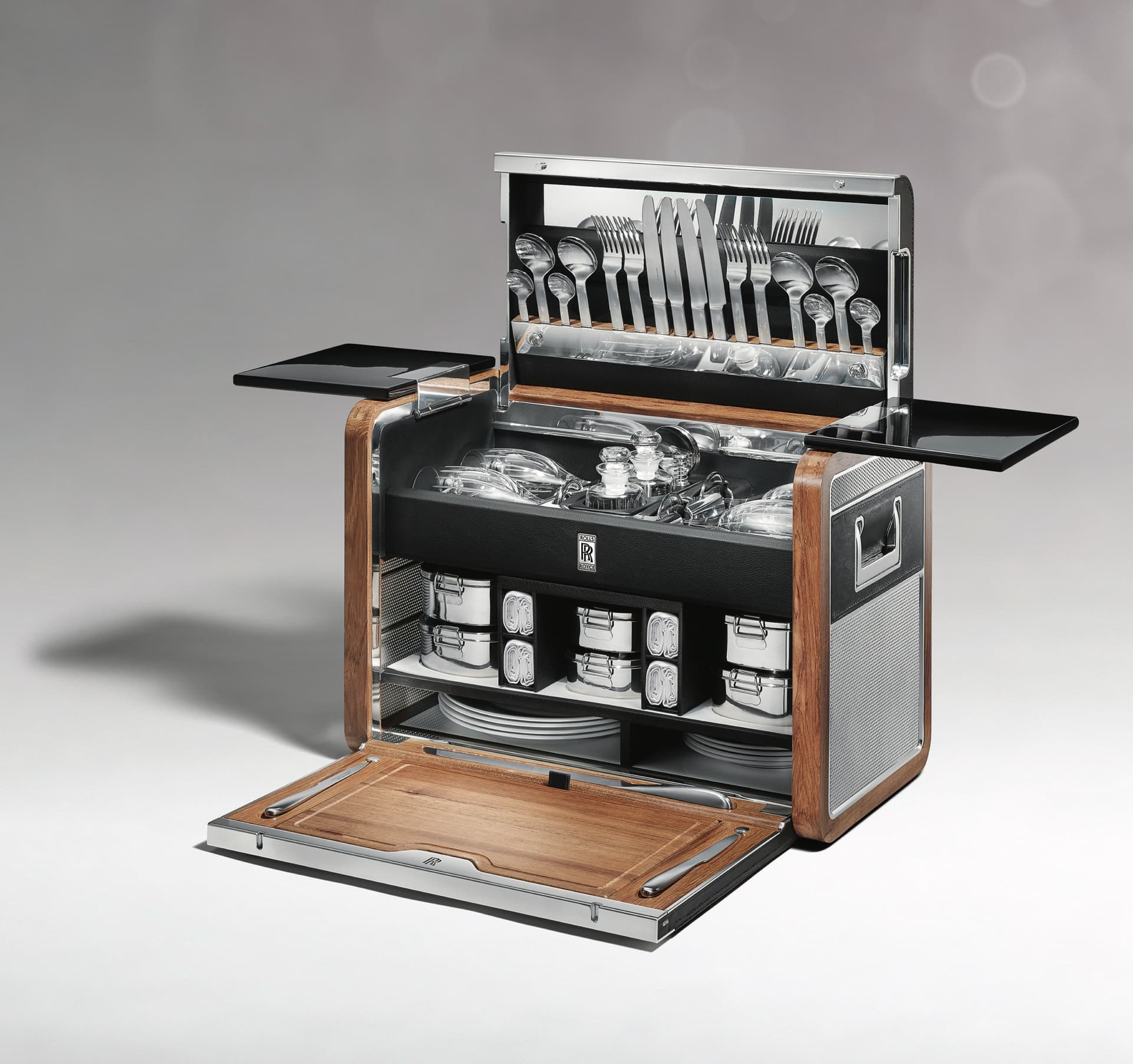 The handcrafted Rolls-Royce Picnic Hamper features everything essential for the finest picnic for four people