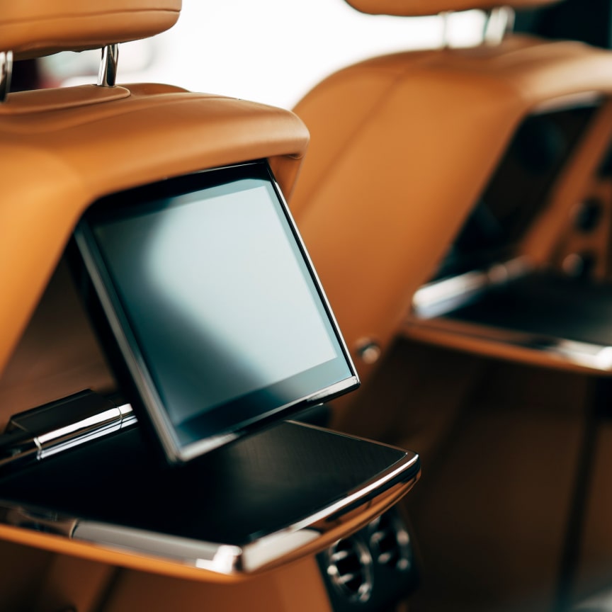 <p>With their elegant fold-out operation, finished with matching interior leather, these picnic tables are perfect for both work and refreshments. Rear passengers will enjoy the convenience of this smart and easy to use accessory.</p>