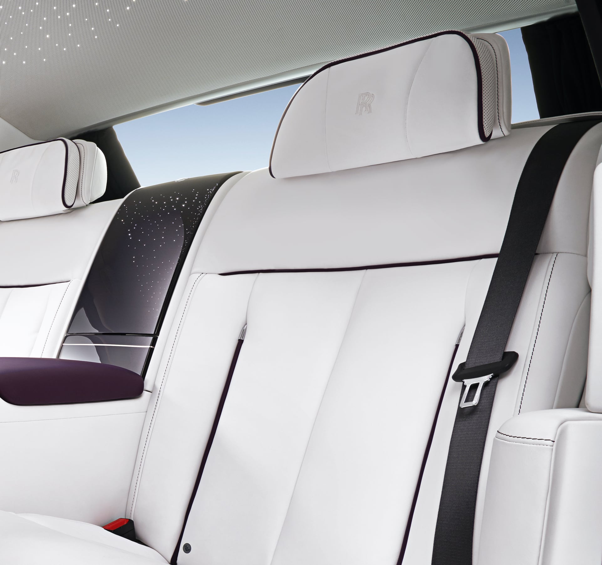 Detail of Rolls-Royce motor car headrest with rear curtain for increased privacy