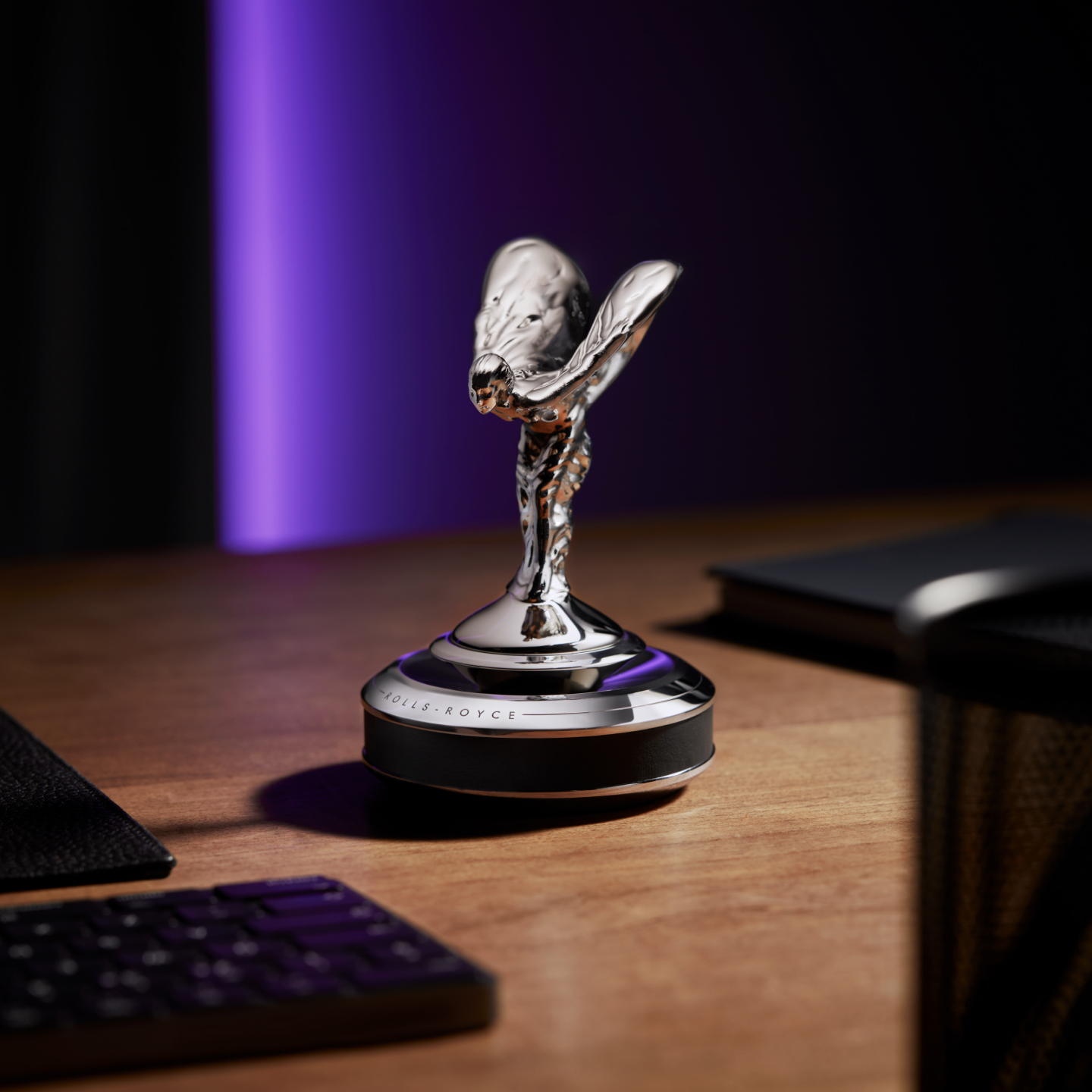 Close view of the Spirit of Ecstasy plinth on a desk