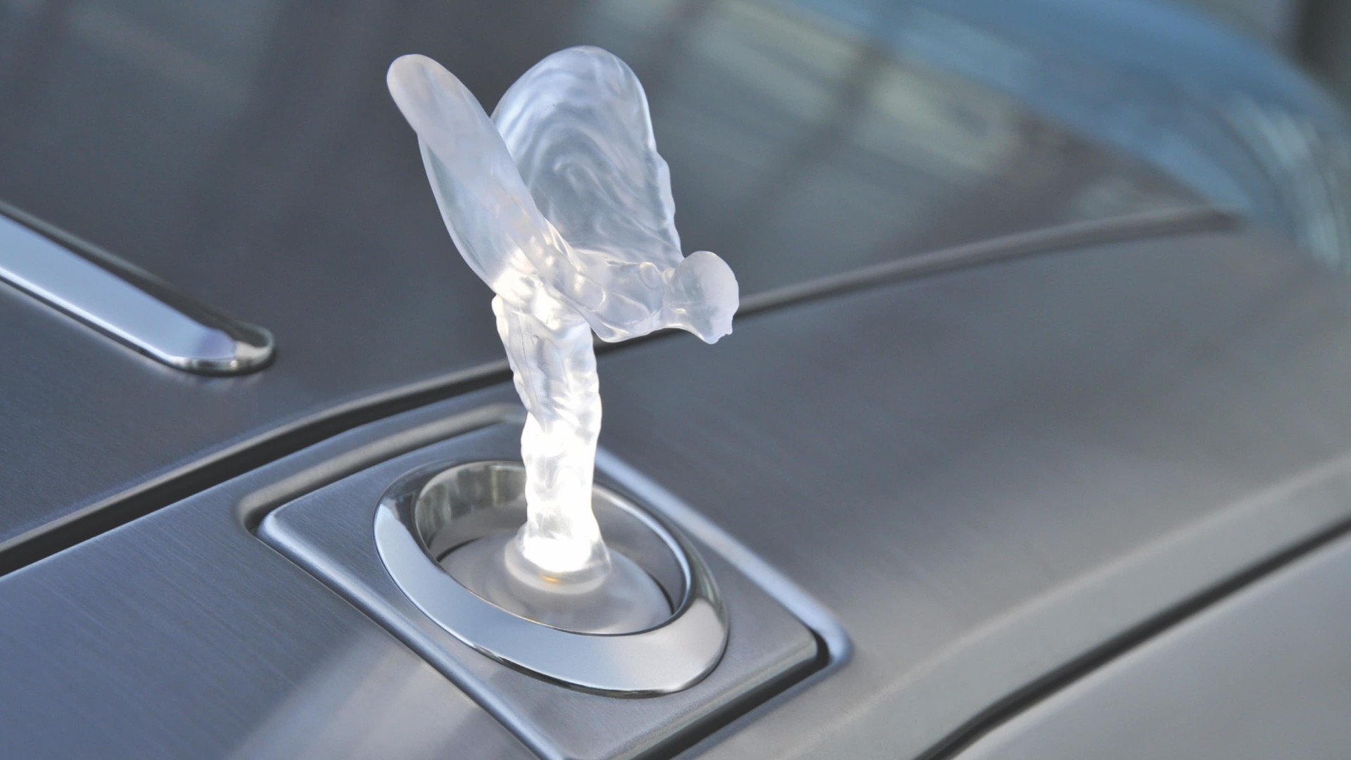 Illuminated Spirit of Ecstasy in frosted finish on Rolls-Royce motor car