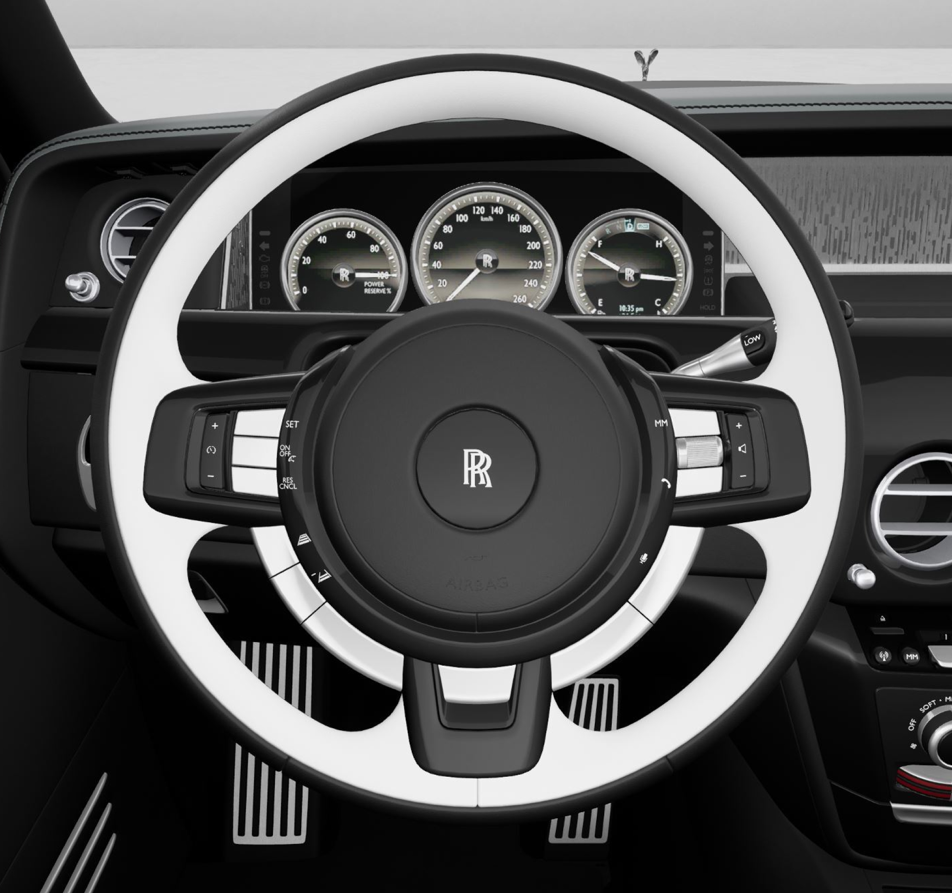 Detailed view of the Rolls-Royce thick rimmed two tone steering wheel in black and artic white leather