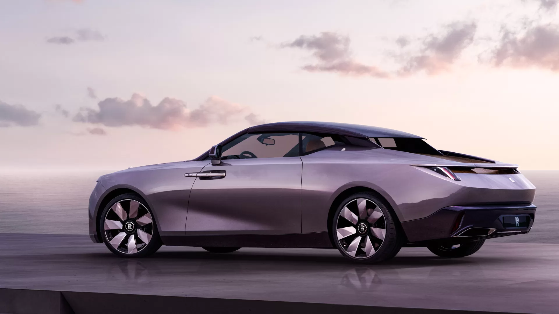 Side view of the Rolls-Royce Amethyst Droptail with its roof,