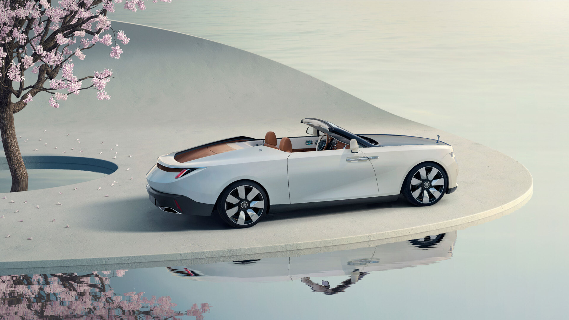 Side profile of Arcadia Droptail on a concrete platform with it's reflection appearing in the water