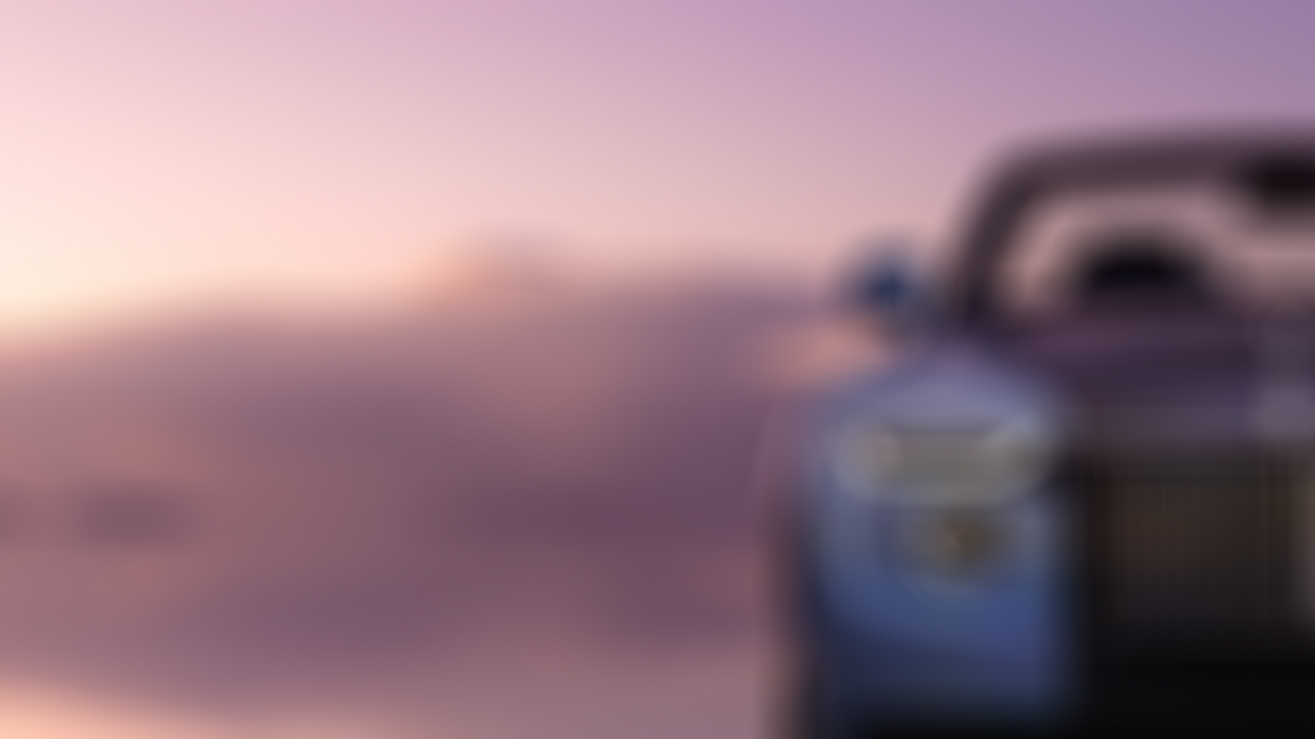 close up of the Boat Tail grille and right front headlight on the salt flats at dawn